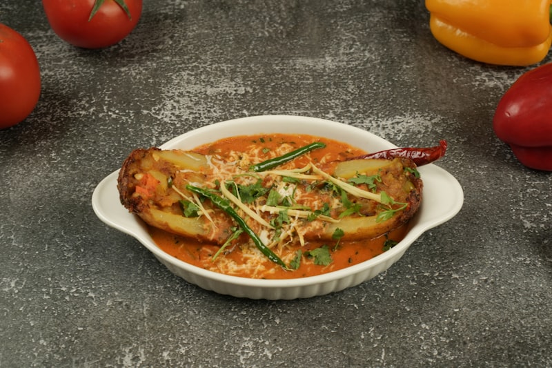 Imam Bayildi — Melanzane Ripiene al Forno in Salsa di Pomodoro
