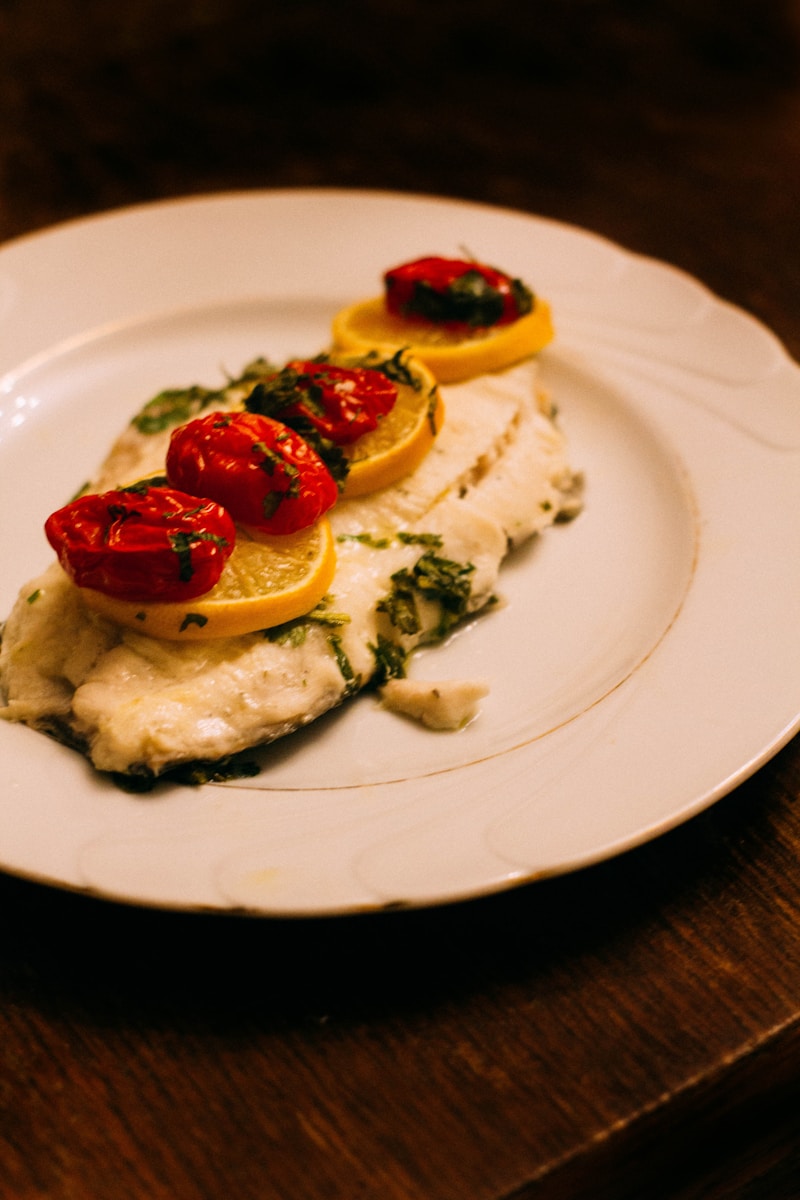 Merluzzo al Forno con Pomodori e Olive Nere